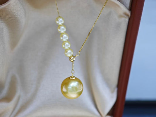 4mm & 11 mm South Sea Golden Pearl Necklace · 18K Gold